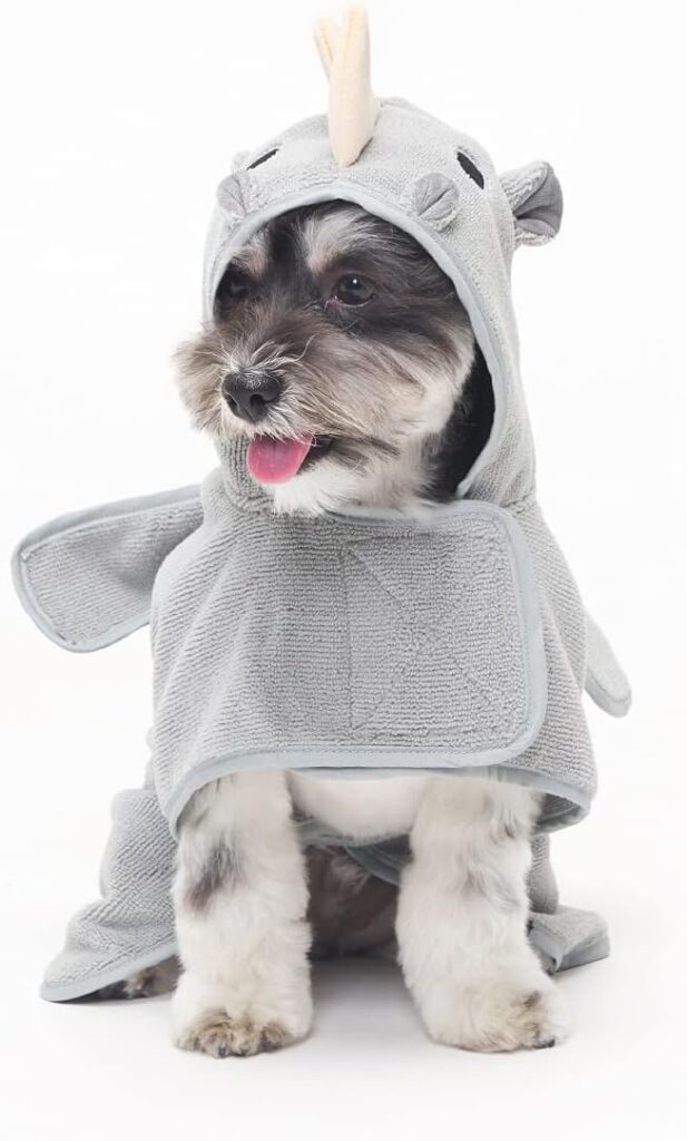 Small Dog Bathrobe - BarkBox's small bath robe measures 20” x 18” and is best for dogs that weigh around 15-30 lbs. We have more sizes available so every furry friend can have their own towel robe and look even cuter than they already are
Rhino Bark n’ Bathe Bathrobe - Your pup will look both adorable and oh-so-ferocious. This adorable robe's Velcro closure and waistband make it easy to put on for a cute bath time look. Just wrap, tie, and snuggle
Fast-Drying Fun - Our animal-themed hooded robes are ultra-absorbent, so even long-haired dogs can dry quickly. Save your bathroom, car, and home from the dreaded wet-dog shake and keep them warm with this cozy towel
Machine Washable - Your pup’s bathrobe is easy to maintain and keep clean. Simply throw it in the wash and tumble dry on a low temperature
100% Happiness - From the makers of BarkBox, this towel bathrobe is designed and manufactured in the USA. All our products are made by dog people to make both dogs and their humans the happiest they can be