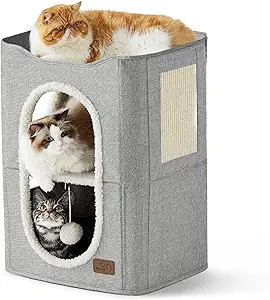 Snug, Private & Full of Fun: Your fur baby gets two spacious hideaways to curl up in, while the upper platform doubles as a perch for some me-time or window-watching. Bonus: the peek-a-boo openings and fluffy toy ball amp up the fun!
Pet-Safe Design: This 2-level cat house is crafted with CARB Certified high-strength medium density fiberboard and plush, gentle lambswool fabric for added comfort. Plus, it's got a sturdy sisal scratching board for hours of kitty entertainment.
Sturdy & Stylish: Built with solid, 9 mm medium density fiberboard, this cat condo isn't just sturdy but also versatile. It fits effortlessly in any space - from the living room to your bedroom (or even the garage). The perfect playground for cats up to 20 Lbs.
Simple Assembly & Maintenance: With our easy-to-follow instructions, this indoor cat condo can be set up in minutes or folded flat when it's time for some deep cleaning or travel. Spot-cleaning is all it needs to stay fresh.
More Room to Lounge: With dimensions of 23 x 18 x 14 inches, our cat house boasts three cozy spots for playtime or relaxing. The 2-level layout offers a roomy yet snug haven for kittens and adult cats alike. Plus, its design is ideal for multi-cat households. Get ready to see your kitty's eyes light up!