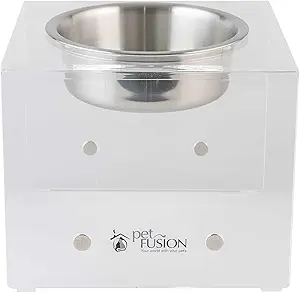 INNOVATIVE MAGNETIC FEEDERS: (I) Premium Lucite acrylic raised pet feeder. (ii) Ultra strong rare Earth magnets securely embedded in each feeder. (iii) Add multiple feeders to create a feeding station to suit your pets needs and keeps things neat & tidy.
IMAGINE THE POSSIBILITIES: (I) Customize your pet's feeding area. (ii) Attach, detach, add-on, mix & match sizes (iii) Perfect for multiple pet households with special diet needs.
PROMOTES YOUR PET'S WELLNESS: (I) Elevated to support digestive health & make mealtime more comfortable. (ii) Promotes good posture and reduces future back issues. (iii) Elevated feeders help to make swallowing easier for your pet. (iv) Please read vet recommendations below.
VETS RECOMMEND: (i) 1 food bowl per pet, especially in event of special nutritional needs & aggressive behavior. (ii) Community water bowl typically ok. (iii) Dogs need 1-2 cups of water per day for every 10 lbs weight. Cats about 5-10 oz water.
YOU SHOULD KNOW: (I) 11x11x9" with 2 U.S. Food Grade SS bowls = 56 oz. / 2.8" deep, dishwasher safe. (ii) Hand wash acrylic stand with warm soapy water. (iii) Anti-slip feet & bowl insets included. (iv) Replacement bowls also available. (v) 12-month warranty.