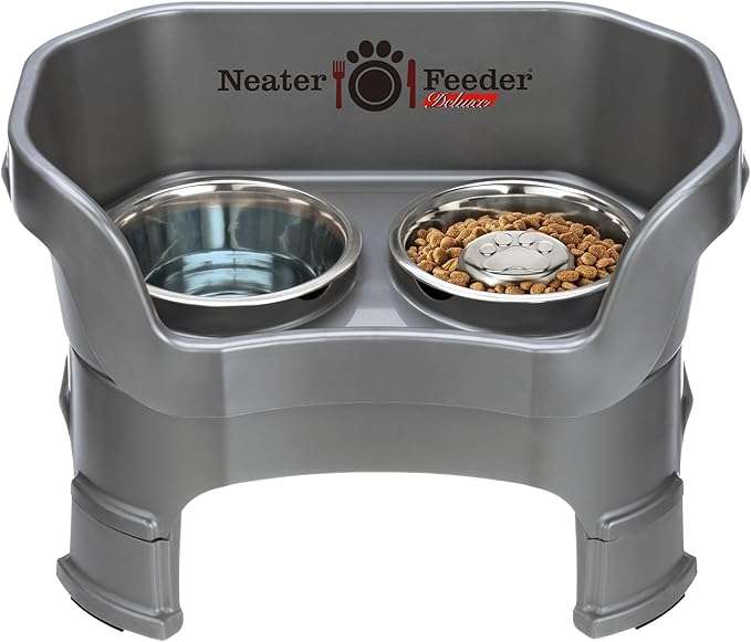 KICK PROOF - Accidents happen but they don't have to ruin your floor!
FOR MEDIUM SIZED DOGS - Includes set of Leg Extensions. Created for taller medium sized dogs weighing 15-40 lbs. with a 12-16" shoulder height.
DIMENSIONS AND CAPACITY - Contains one 1 cup stainless steel slow feed food bowl, one 5 cup extra capacity stainless steel water bowl, and a set of non-skid rubber pads. Dimensions: 18" L x 11" W x 12.5" H.
SPILL PROOF - Food stays on top and water drains below.
FEEDING HEIGHT - 5 inches without leg extensions or 7.5 inches with leg extensions.
PATENTED & PATENTS PENDING - You can only get our floor-saving design with an official & authentic Neater Feeder.